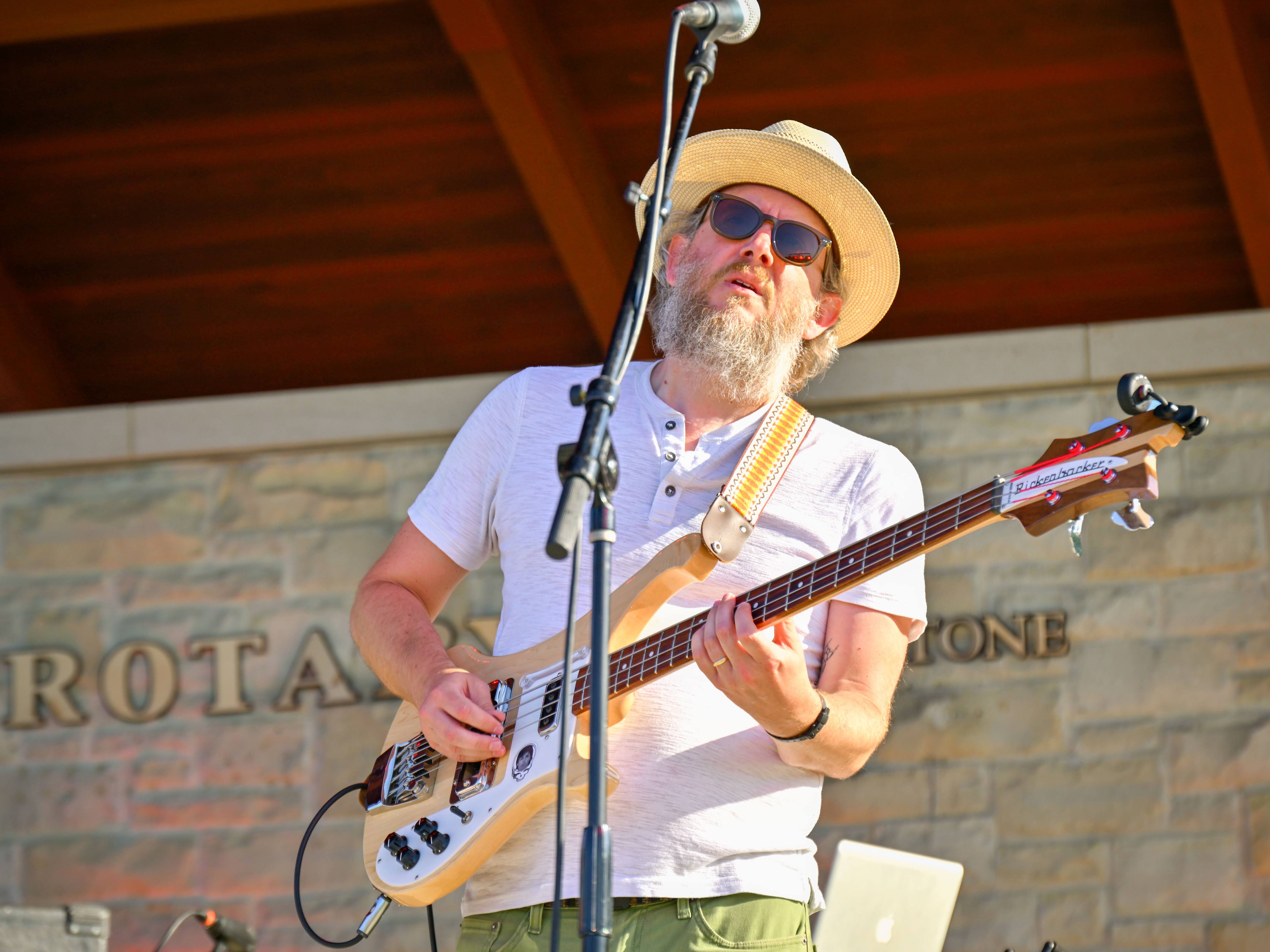 Rob Collier playing bass guitar